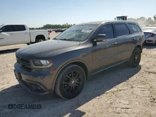 2015 Dodge Durango R/T with VIN 1C4SDHCT8FC953273, listed as a Copart auction lot 50690715 with 119,259 mi miles and Salvage title. Bid and sale history available at DreamBid. Image 1.