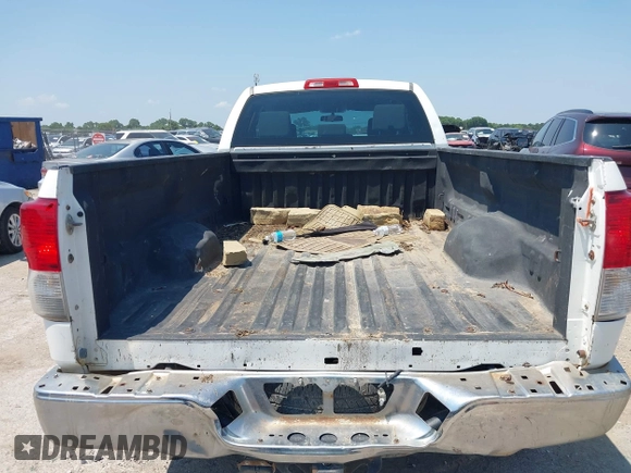 2010 Toyota Tundra SR with VIN 5TFTY5F19AX006696, listed as a IAAI auction lot 42379570 with 332,246 mi miles and . Bid and sale history available at DreamBid. Image 16.