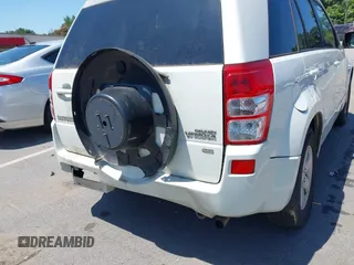 2011 Suzuki Grand Vitara Premium z VIN JS3TD0D2XB4103016, wystawiony jako IAAI lot #42568549 z przebiegiem 156 595 mil mil oraz . Historia ofert i sprzedaży dostępna na DreamBid. Obrazek 6.