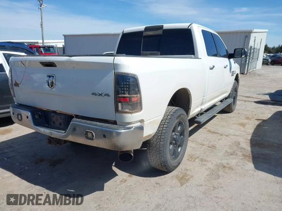 2016 Ram 2500 SLT with VIN 3C6UR5DLXGG209185, listed as a IAAI auction lot 41814628 with 298,573 mi miles. Bid and sale history available at carsss.com. Image 4.