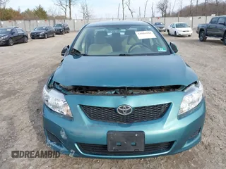 2009 Toyota Corolla with VIN JTDBL40E29J017358, listed as a IAAI auction lot 41041604 with 233,205 mi miles. Bid and sale history available at carsss.com. Image 12.