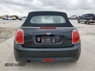 2019 MINI Convertible Cooper с VIN WMWWG5C5XK3E22725, выставлен на аукционе Copart как лот 54779825 с пробегом 43 586 миль миль и Списание • Salvage title. История ставок и продаж доступна на DreamBid. Изображение 6.