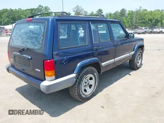 2001 Jeep Cherokee Sport with VIN 1J4FT48S01L603930, listed as a IAAI auction lot 42503730 with 149,030 mi miles and . Bid and sale history available at DreamBid. Image 4.