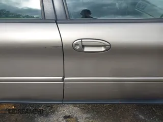 2003 Ford Taurus SE Standard with VIN 1FAFP53U63G125751, listed as a IAAI auction lot 41933803 with 196,710 mi miles. Bid and sale history available at carsss.com. Image 19.
