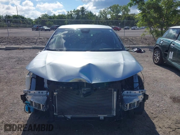 2025 Honda Civic Sport z VIN 2HGFE2F59SH549528, wystawiony jako IAAI lot #42232674 z przebiegiem 8 889 mil mil oraz . Historia ofert i sprzedaży dostępna na DreamBid. Obrazek 12.