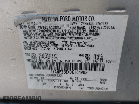 2013 Ford Taurus SEL with VIN 1FAHP2E8XDG164903, listed as a IAAI auction lot 41580690 with 163,128 mi miles and . Bid and sale history available at carsss.com. Image 9.