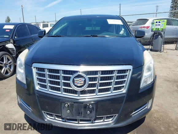 2013 Cadillac XTS Luxury z VIN 2G61R5S32D9226506, wystawiony jako IAAI lot #42208105 z przebiegiem 140 255 mil mil oraz . Historia ofert i sprzedaży dostępna na DreamBid. Obrazek 12.