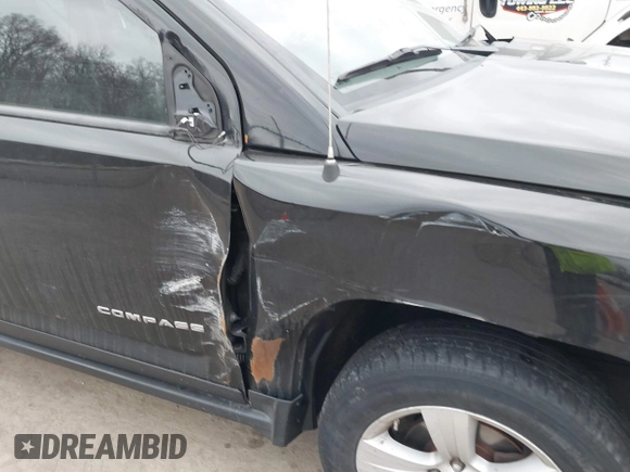 2012 Jeep Compass Latitude with VIN 1C4NJDEB1CD555704, listed as a IAAI auction lot 41713800 with 198,553 mi miles and . Bid and sale history available at DreamBid. Image 6.