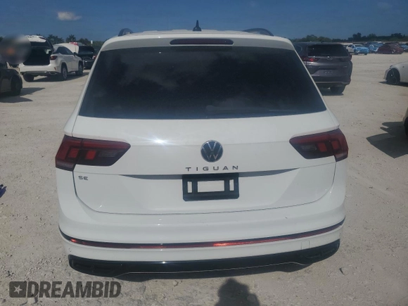 2022 Volkswagen Tiguan SE R-Line Black with VIN 3VVCB7AX8NM009403, listed as a Copart auction lot 52720885 with 74,063 mi miles and Salvage title. Bid and sale history available at DreamBid. Image 6.