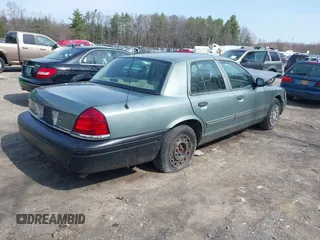 2005 Ford Crown Victoria Standard с VIN 2FAFP73W25X121741, выставлен на аукционе IAAI как лот 42059966 с пробегом 99 667 миль миль и . История ставок и продаж доступна на DreamBid. Изображение 4.