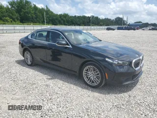 2024 BMW 5 Series 530i with VIN WBA43FJ09RCR05243, listed as a Copart auction lot 61690705 with 34,450 mi miles and Salvage title. Bid and sale history available at DreamBid. Image 4.