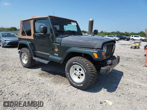 1997 Jeep Wrangler Sahara with VIN 1J4FY49S3VP519387, listed as a Copart auction lot 63822395 with 187,884 mi miles and Salvage title. Bid and sale history available at DreamBid. Image 4.