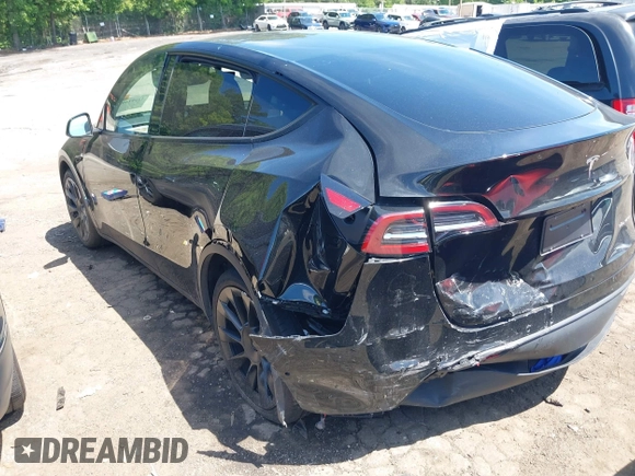 2022 Tesla Model Y Long Range z VIN 7SAYGDEE4NA006645, wystawiony jako IAAI lot #42192495 z przebiegiem 28 784 mil mil oraz . Historia ofert i sprzedaży dostępna na DreamBid. Obrazek 3.