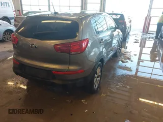 2015 Kia Sportage LX with VIN KNDPB3ACXF7686082, listed as a IAAI auction lot 41282616 with 107,613 mi miles and . Bid and sale history available at carsss.com. Image 4.