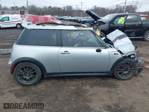 2006 MINI Hardtop S with VIN WMWRE33546TL23876, listed as a IAAI auction lot 41858060 with 146,359 mi miles and . Bid and sale history available at DreamBid. Image 13.