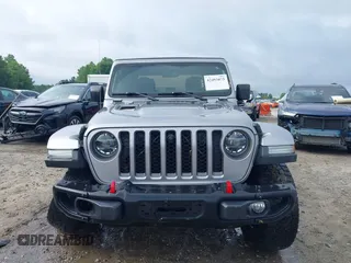 2020 Jeep Gladiator Rubicon z VIN 1C6JJTBG7LL181833, wystawiony jako IAAI lot #42493073 z przebiegiem 13 775 mil mil oraz . Historia ofert i sprzedaży dostępna na DreamBid. Obrazek 12.