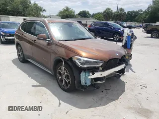 2016 BMW X1 xDrive28i with VIN WBXHT3C31GP880132, listed as a Copart auction lot 69129132 with 74,759 mi miles. Bid and sale history available at carsss.com. Image 1.