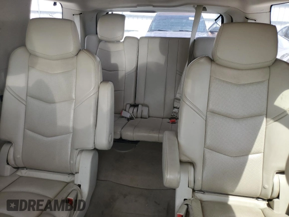 2015 Cadillac Escalade Luxury z VIN 1GYS4MKJ5FR584162, wystawiony jako Copart lot #54358175 z przebiegiem 153 137 mil mil oraz Szkoda całkowita • Salvage title. Historia ofert i sprzedaży dostępna na DreamBid. Obrazek 10.