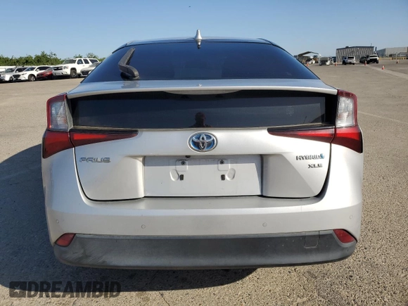 2020 Toyota Prius L Eco z VIN JTDKARFU1L3122471, wystawiony jako Copart lot #54164935 z przebiegiem 130 642 mil mil oraz Szkoda całkowita • Salvage title. Historia ofert i sprzedaży dostępna na DreamBid. Obrazek 6.