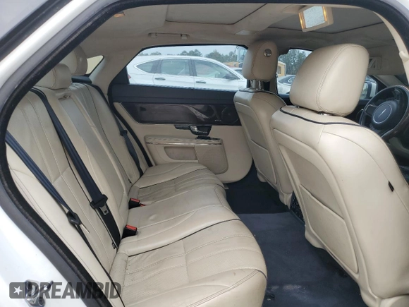 2013 Jaguar XJ with VIN SAJWA2GB8DLV52975, listed as a Copart auction lot 79123644 with 160,473 mi miles and Salvage Title. Bid and sale history available at carsss.com. Image 10.
