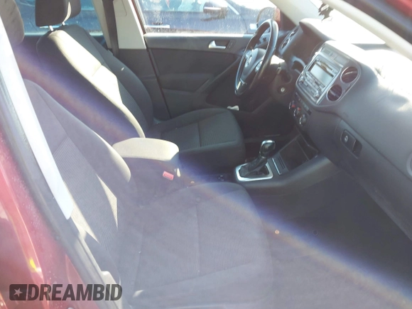 2013 Volkswagen Tiguan S with VIN WVGAV3AX1DW098392, listed as a IAAI auction lot 41420676 with 75,279 mi miles and . Bid and sale history available at DreamBid. Image 5.