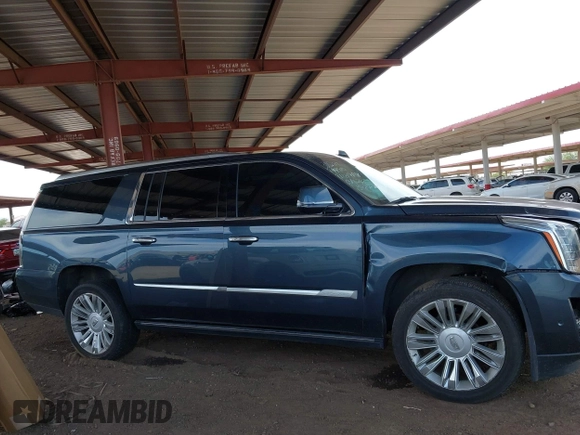 2019 Cadillac Escalade ESV Platinum z VIN 1GYS4KKJ5KR194810, wystawiony jako IAAI lot #42360267 z przebiegiem 106 662 mil mil oraz . Historia ofert i sprzedaży dostępna na DreamBid. Obrazek 13.