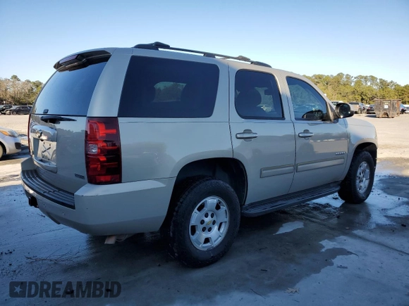 2012 Chevrolet Tahoe LS with VIN 1GNSCAE02CR260728, listed as a Copart auction lot 87588665 with 244,107 mi miles and Salvage title. Bid and sale history available at DreamBid. Image 3.