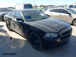 2013 Dodge Charger SE with VIN 2C3CDXBG9DH681172, listed as a IAAI auction lot 41761125 with 117,040 mi miles. Bid and sale history available at carsss.com. Image 1.