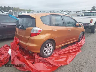 2009 Honda Fit Sport with VIN JHMGE88469S069328, listed as a IAAI auction lot 41464558 with 219,541 mi miles. Bid and sale history available at carsss.com. Image 4.