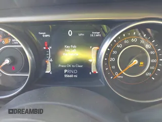 2018 Jeep Wrangler Unlimited Sport S with VIN 1C4HJXDN0JW255003, listed as a IAAI auction lot 41528394 with 55,660 mi miles and . Bid and sale history available at DreamBid. Image 7.