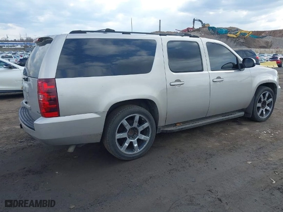 2007 Chevrolet Suburban LT with VIN 1GNFK16327J210722, listed as a IAAI auction lot 41899366 with 1 mi miles. Bid and sale history available at carsss.com. Image 4.