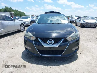2016 Nissan Maxima Platinum with VIN 1N4AA6AP1GC901425, listed as a IAAI auction lot 42526689 with 118,804 mi miles and . Bid and sale history available at DreamBid. Image 12.