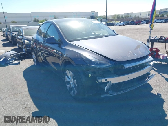 2023 Tesla Model Y Long Range with VIN 7SAYGAEE8PF976969, listed as a IAAI auction lot 41877784 with 25,896 mi miles. Bid and sale history available at carsss.com. Image 1.
