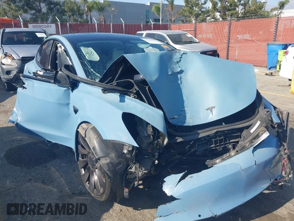 2022 Tesla Model 3 Performance with VIN 5YJ3E1EC1NF144236, listed as a IAAI auction lot 41189644 with Not Provided miles. Bid and sale history available at carsss.com. Image 6.