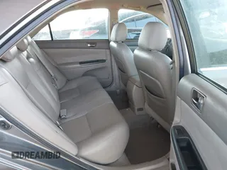 2006 Toyota Camry LE z VIN 4T1BF32K86U635925, wystawiony jako IAAI lot #42267547 z przebiegiem 162 593 mil mil oraz . Historia ofert i sprzedaży dostępna na DreamBid. Obrazek 8.