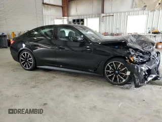 2022 BMW i4 eDrive40 with VIN WBY73AW03NFM94635, listed as a Copart auction lot 60828383 with 4,570 mi miles. Bid and sale history available at carsss.com. Image 4.