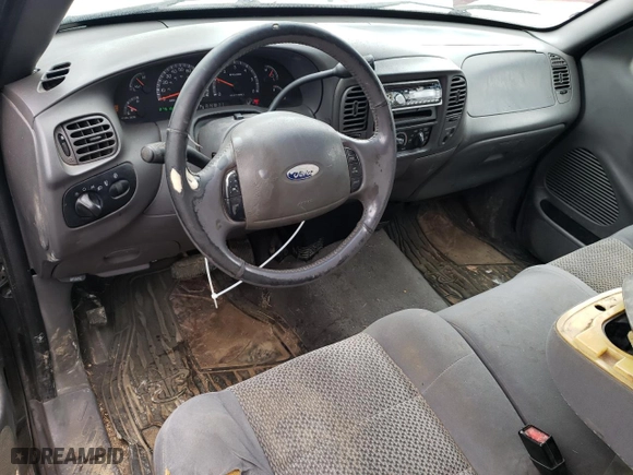 2003 Ford F-150 XL with VIN 1FTRX07223KB18294, listed as a Copart auction lot 42558205 with 276,165 mi miles and Salvage Title. Bid and sale history available at carsss.com. Image 8.