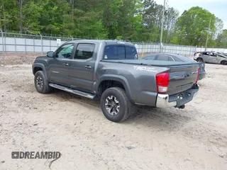 2017 Toyota Tacoma SR5 with VIN 3TMAZ5CN7HM026618, listed as a IAAI auction lot 42033682 with 96,430 mi miles and . Bid and sale history available at carsss.com. Image 3.