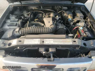 1999 Ford Ranger XLT with VIN 1FTZR15X2XPB15533, listed as a Copart auction lot 68529404 with 124,695 mi miles and Clean Title. Bid and sale history available at carsss.com. Image 13.