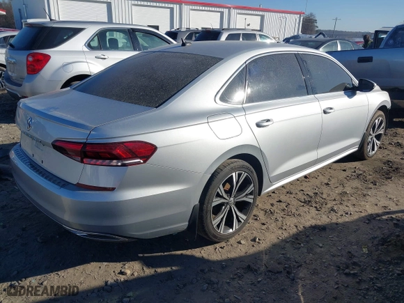 2021 Volkswagen Passat 2.0T SE with VIN 1VWSA7A30MC014523, listed as a IAAI auction lot 41443657 with 101,350 mi miles. Bid and sale history available at carsss.com. Image 4.