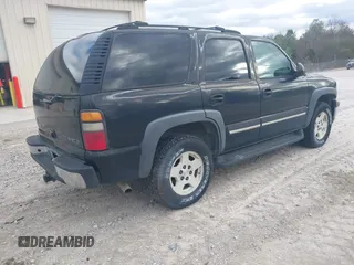 2004 Chevrolet Tahoe LT with VIN 1GNEC13Z74J314927, listed as a IAAI auction lot 41231288 with 195,809 mi miles and . Bid and sale history available at DreamBid. Image 4.
