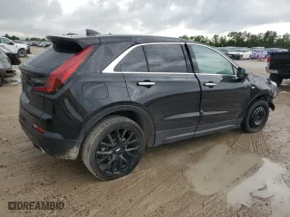 2023 Cadillac XT4 FWD Luxury with VIN 1GYAZAR45PF218684, listed as a Copart auction lot 54427565 with 74,920 mi miles and Salvage Title. Bid and sale history available at carsss.com. Image 3.