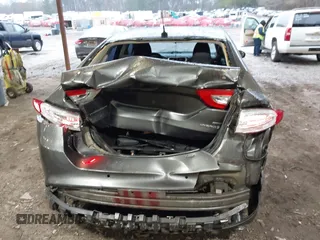 2015 Ford Fusion SE Hybrid with VIN 3FA6P0LU6FR248904, listed as a IAAI auction lot 41556607 with 224,799 mi miles. Bid and sale history available at carsss.com. Image 16.