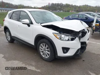 2015 Mazda CX-5 Touring with VIN JM3KE2CY3F0550624, listed as a IAAI auction lot 41931268 with 51,588 mi miles and . Bid and sale history available at carsss.com. Image 1.