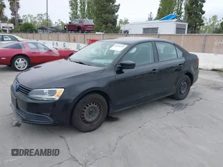 2013 Volkswagen Jetta Sedan S with VIN 3VW2K7AJ8DM237564, listed as a IAAI auction lot 42104259 with 145,375 mi miles. Bid and sale history available at carsss.com. Image 2.