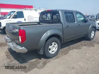 2005 Nissan Frontier LE with VIN 1N6AD07W35C438405, listed as a IAAI auction lot 42469804 with 128,472 mi miles and . Bid and sale history available at DreamBid. Image 4.