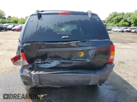 2004 Jeep Grand Cherokee Laredo z VIN 1J4GW48S24C217901, wystawiony jako Copart lot #60436675 z przebiegiem 263 837 mil mil oraz Szkoda całkowita • Salvage title. Historia ofert i sprzedaży dostępna na DreamBid. Obrazek 6.