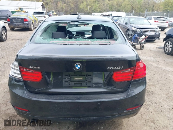 2014 BMW 3 Series 320i xDrive with VIN WBA3C3C59EF984070, listed as a IAAI auction lot 42063569 with 169,002 mi miles and . Bid and sale history available at DreamBid. Image 16.