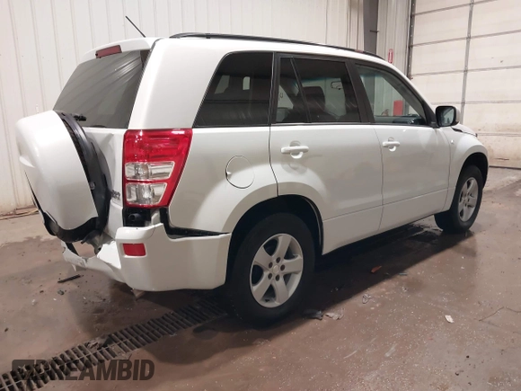2006 Suzuki Grand Vitara Premium with VIN JS3TD943664100584, listed as a IAAI auction lot 41453129 with 159,220 mi miles and . Bid and sale history available at DreamBid. Image 4.