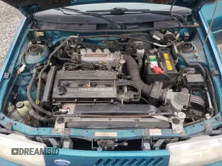 1995 Ford Escort z VIN 1FASP1284SW307142, wystawiony jako Copart lot #88531955 z przebiegiem 93 323 mil mil oraz Szkoda całkowita • Salvage title. Historia ofert i sprzedaży dostępna na DreamBid. Obrazek 13.